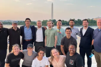 Group of students posing in front of Washington Monument