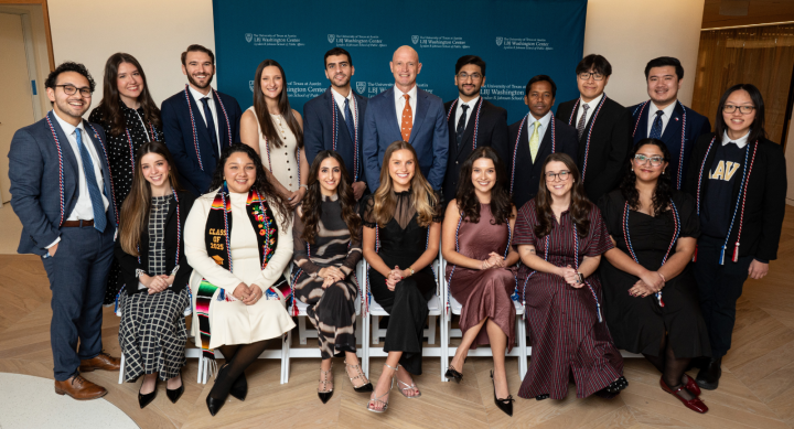 17 graduates and the LBJ School Dean in 2 rows